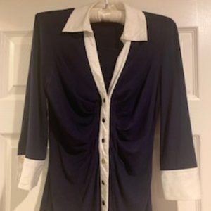 Navy knit top with ruching and white contrast collar/cuffs